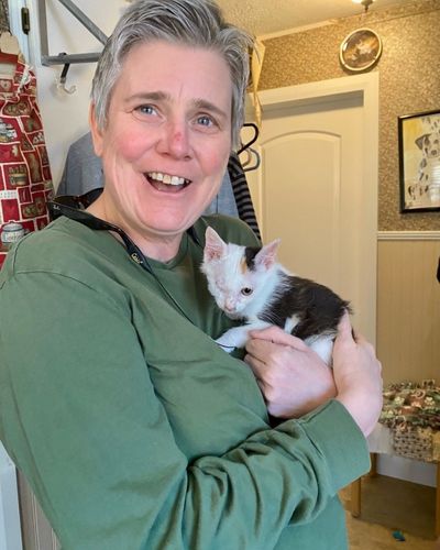 Polly's adoption picture with new guardian.